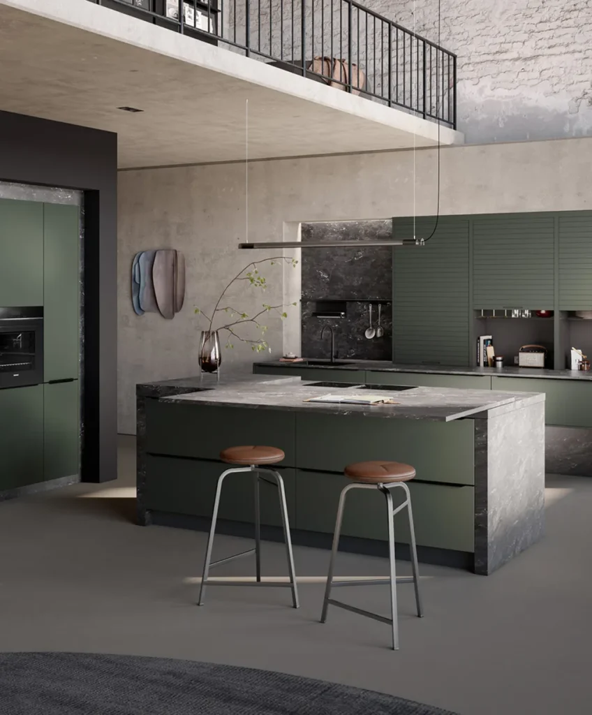 Luxury modern kitchen design with matte green cabinetry, stone benchtops, island seating and industrial finishes