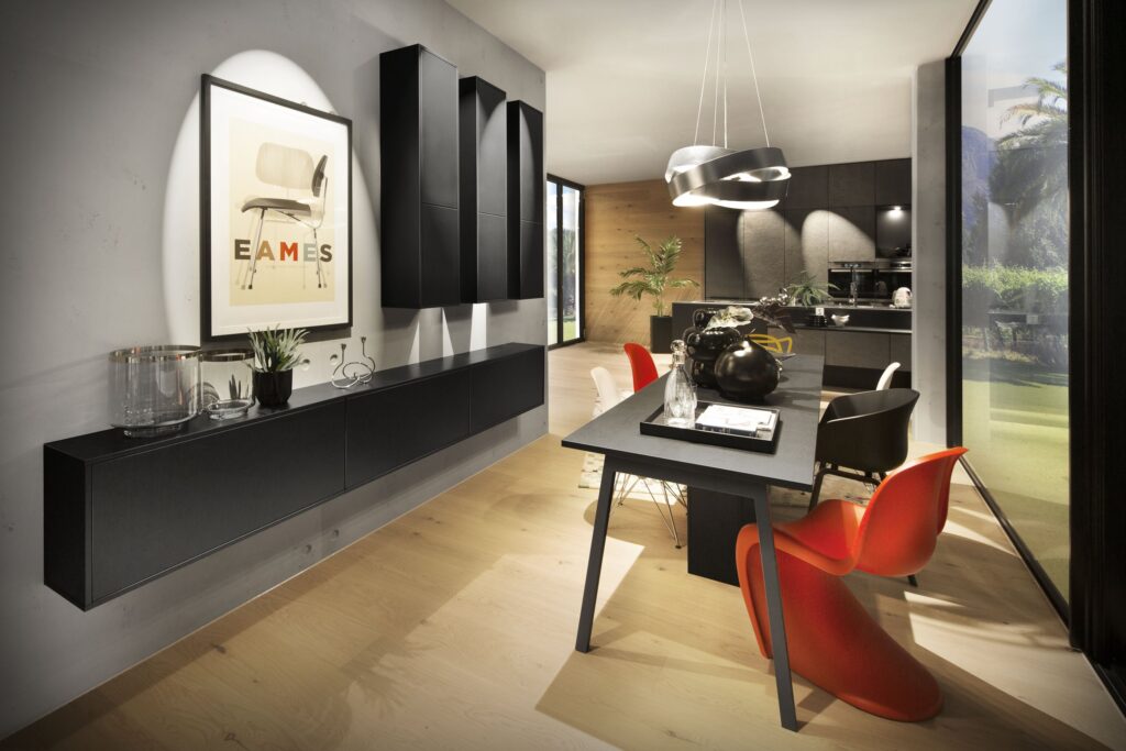 Modern black kitchen and dining area