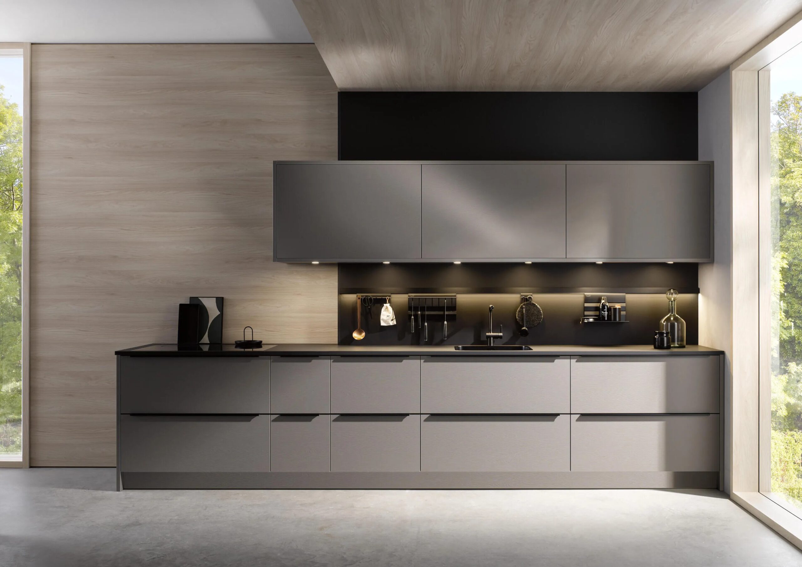 Premium dark grey Häcker kitchen with handleless cabinetry